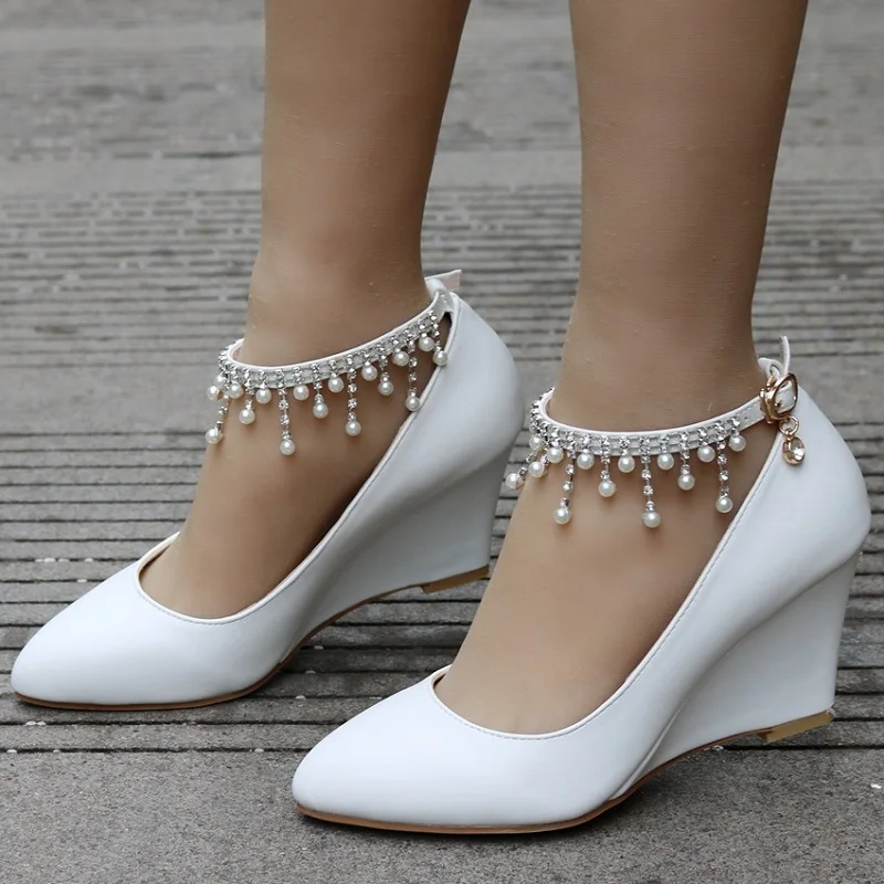 2021spring new wedge high heels large size banquet dress bridal wedding shoes pearl shallow mouth large size women's single shoe 
2021spring new wedge high heels large size banquet dress bridal wedding shoes pearl shallow mouth large size women's single shoe
