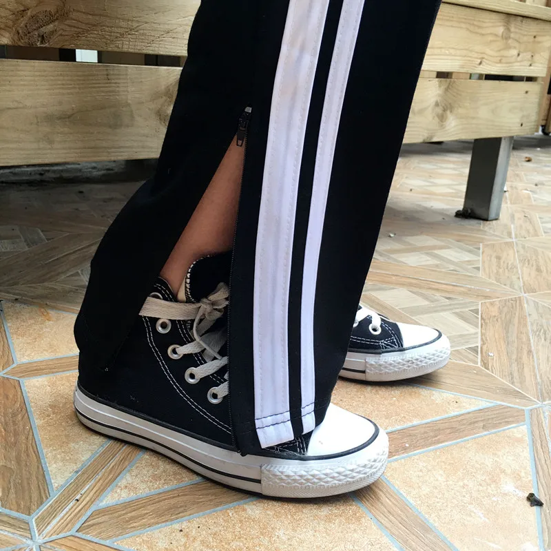 Streetwear Women Harajuku Striped Casual Jogger Sweatpants Zipper Split Elastic High Waist Pants New Female Wide Legged Trousers
Streetwear Women Harajuku Striped Casual Jogger Sweatpants Zipper Split Elastic High Waist Pants New Female Wide Legged Trousers