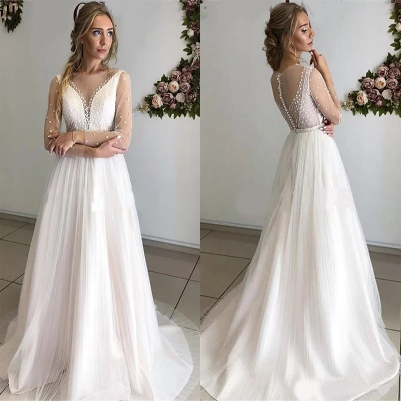 Свадебные платья с длинным рукавом, 2020, со шлейфом и жемчугом, прозрачные, для сада, свадебные платья в стиле кантри
Свадебные платья с длинным рукавом, 2020, со шлейфом и жемчугом, прозрачные, для сада, свадебные платья в стиле кантри