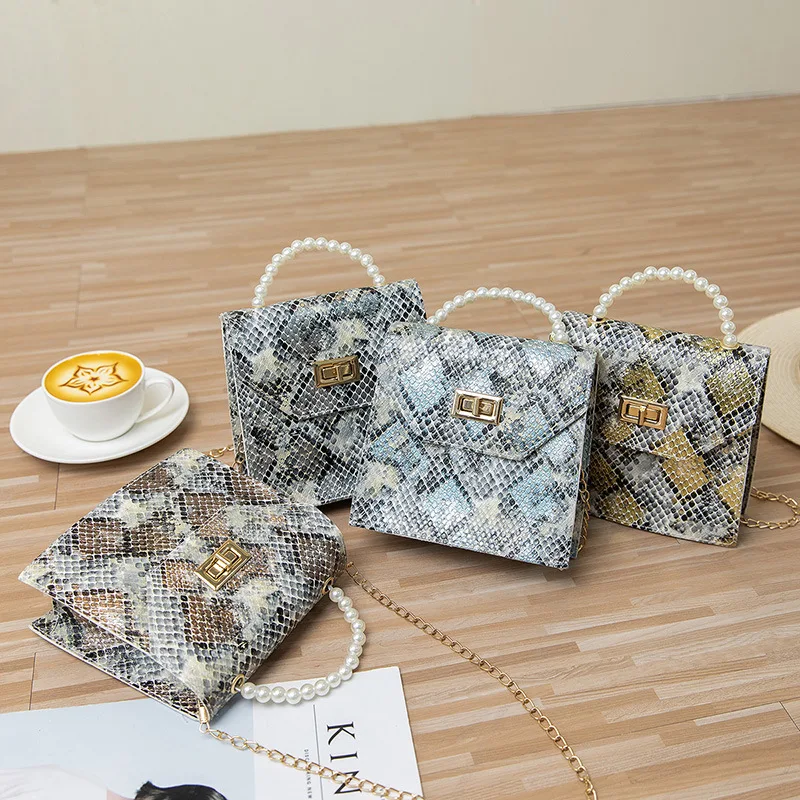 Snake Pattern Women Bags 2021 New Fashion Pearl Shoulder Bag Diagonal Women Bag Chain Animal Pattern Buckle Small Square Bag
Snake Pattern Women Bags 2021 New Fashion Pearl Shoulder Bag Diagonal Women Bag Chain Animal Pattern Buckle Small Square Bag