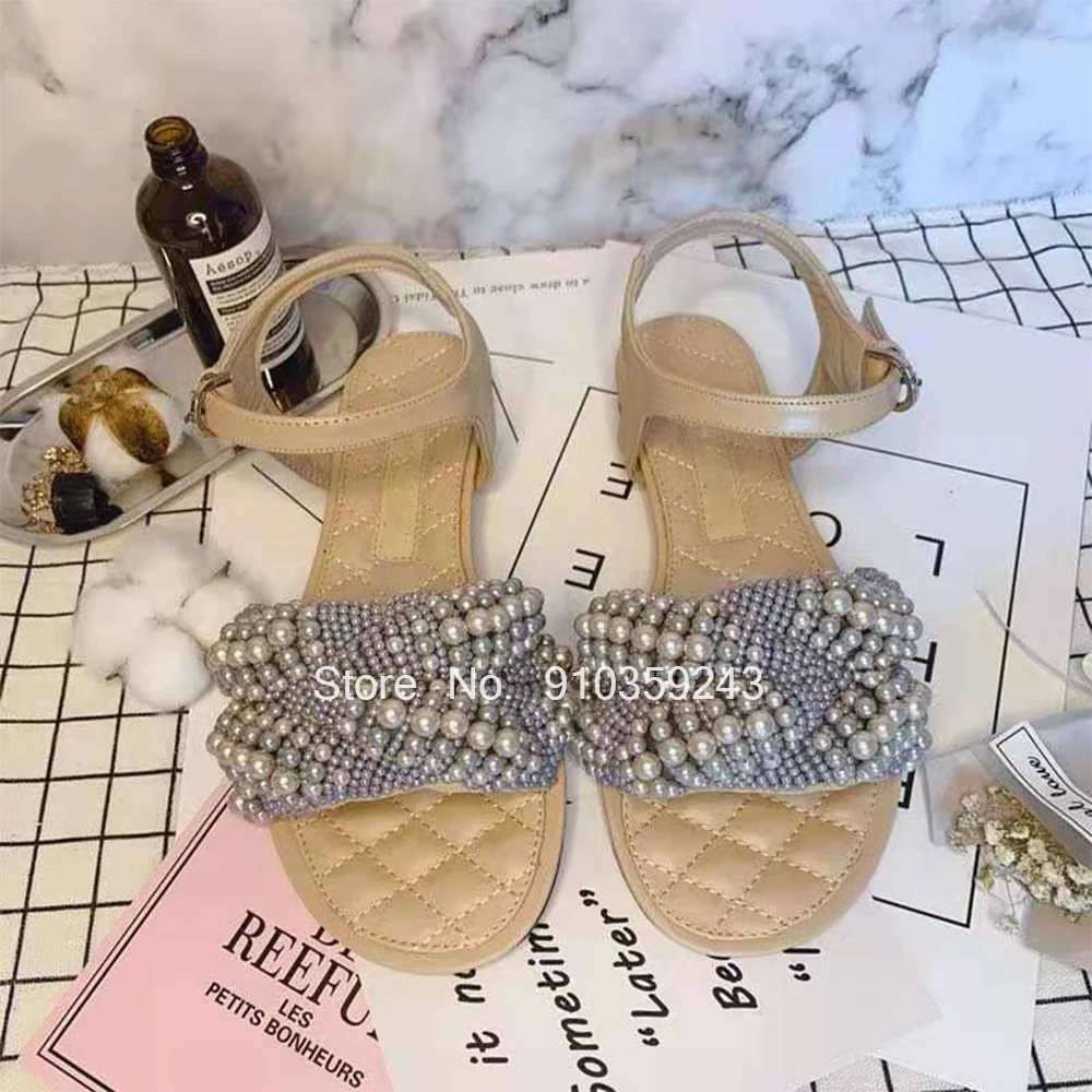 Spring and summer designer brand high-quality genuine leather with handmade pearl beaded elements trendy ladies sandals in size
Spring and summer designer brand high-quality genuine leather with handmade pearl beaded elements trendy ladies sandals in size