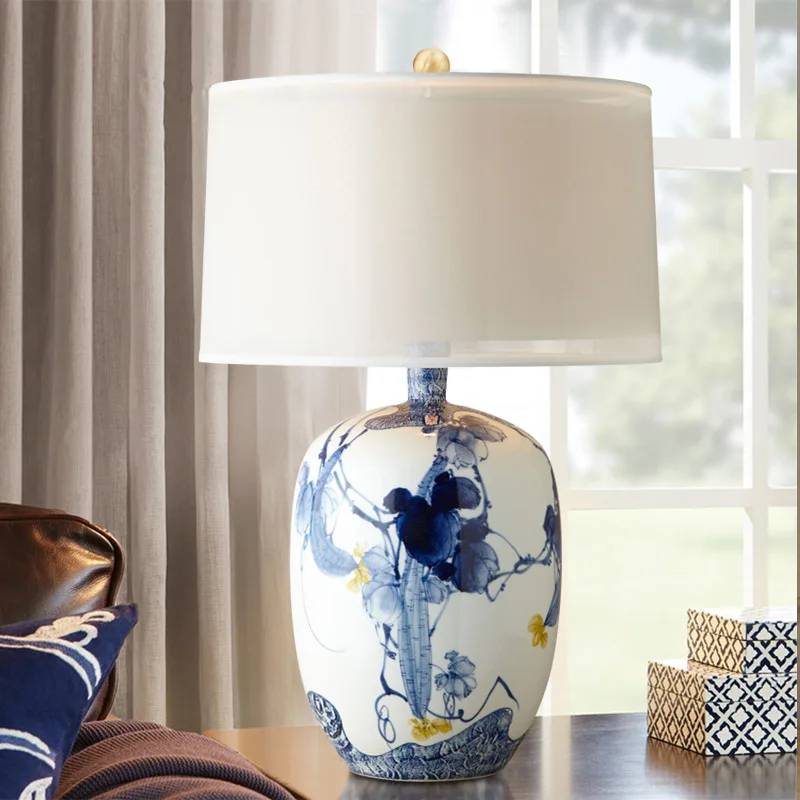 New Chinese style simple bedroom bedside lamp hand-painted blue and white porcelain table lamp living room decoration table lamp
New Chinese style simple bedroom bedside lamp hand-painted blue and white porcelain table lamp living room decoration table lamp