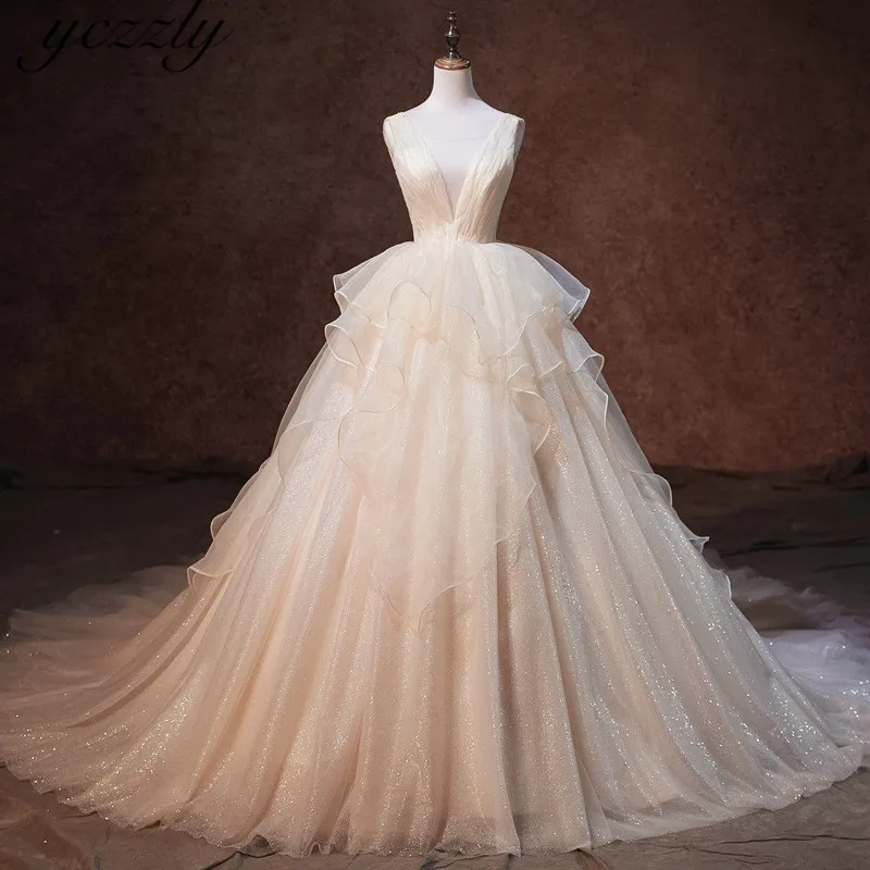 Vestidos De Novia Sexis Sparkly V-neck Ball Gown Ruffles Wedding Gowns 2019 Backless Queen Wedding Dress Robe Mariee W80
Vestidos De Novia Sexis Sparkly V-neck Ball Gown Ruffles Wedding Gowns 2019 Backless Queen Wedding Dress Robe Mariee W80