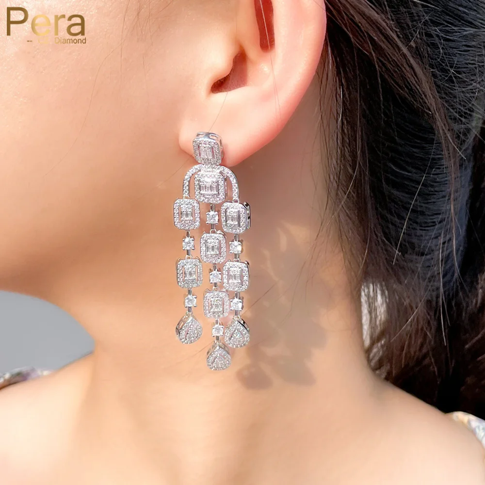 Pera Magnificent White Gold Cubic Zirconia Long Dangling Chandelier Drop Earrings for Brides Luxury Wedding Party Jewelry E827
Pera Magnificent White Gold Cubic Zirconia Long Dangling Chandelier Drop Earrings for Brides Luxury Wedding Party Jewelry E827