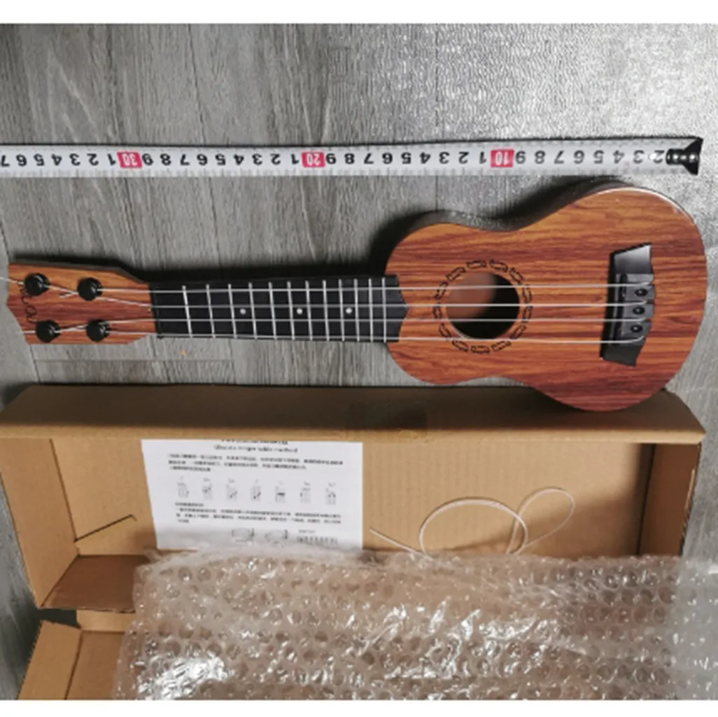 Funny Ukulele Musical Instrument Kids Guitar Montessori Toys for Children School Play Game Education Christmas Birthday Gift
Funny Ukulele Musical Instrument Kids Guitar Montessori Toys for Children School Play Game Education Christmas Birthday Gift