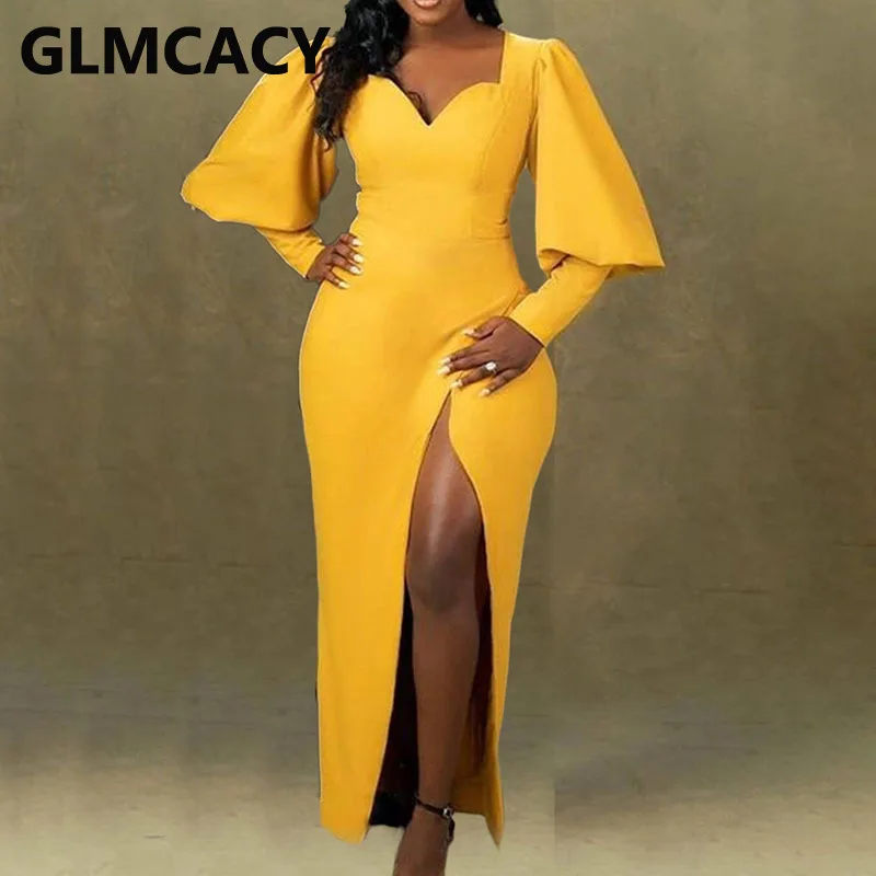 Женское платье-макси с пышными рукавами и высоким разрезом
Женское платье-макси с пышными рукавами и высоким разрезом