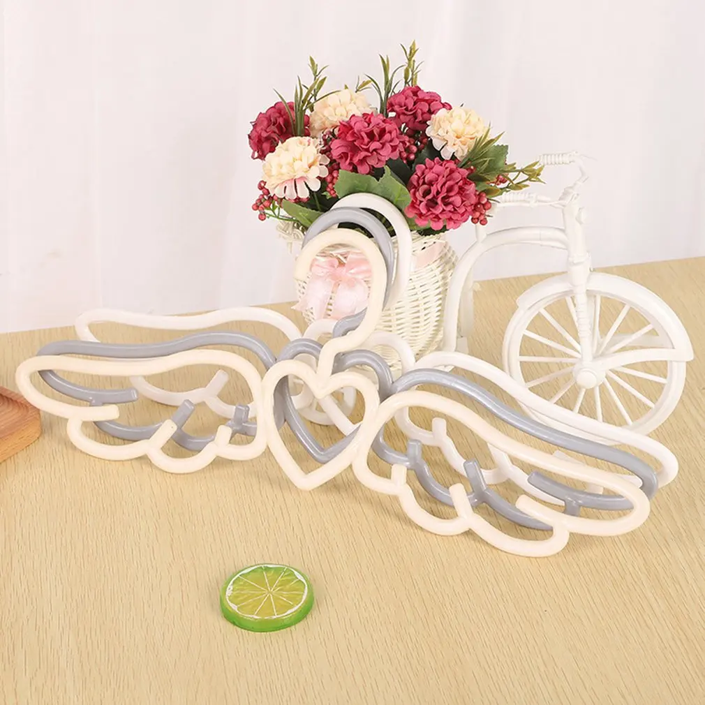 Household clothes rack Adult multifunctional love wings hanger beautiful angel clothes plastic hanger
Household clothes rack Adult multifunctional love wings hanger beautiful angel clothes plastic hanger