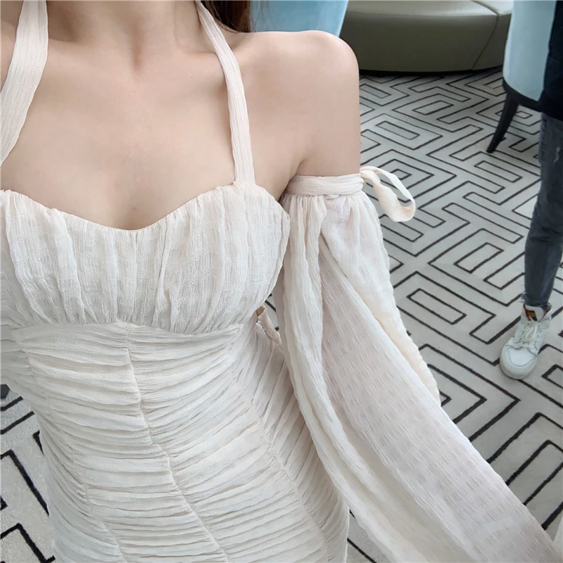 Seaside Holiday Beach Dress 2021 Summer Dress New Korean Version Slim Body Waist Sexy Buttocks Hanging Neck Long Sleeve Dress
Seaside Holiday Beach Dress 2021 Summer Dress New Korean Version Slim Body Waist Sexy Buttocks Hanging Neck Long Sleeve Dress