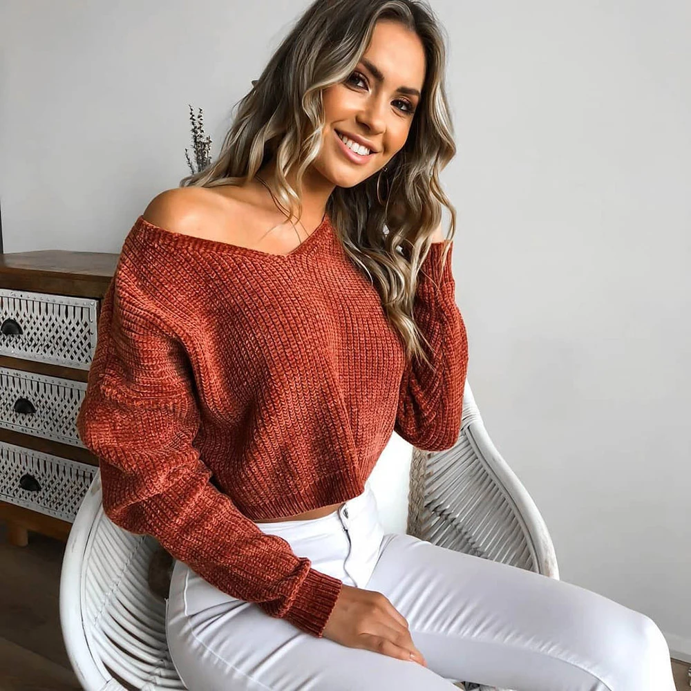 Autumn and winter European and American women's loose V-neck solid color large size navel thick knit short sweater
Autumn and winter European and American women's loose V-neck solid color large size navel thick knit short sweater