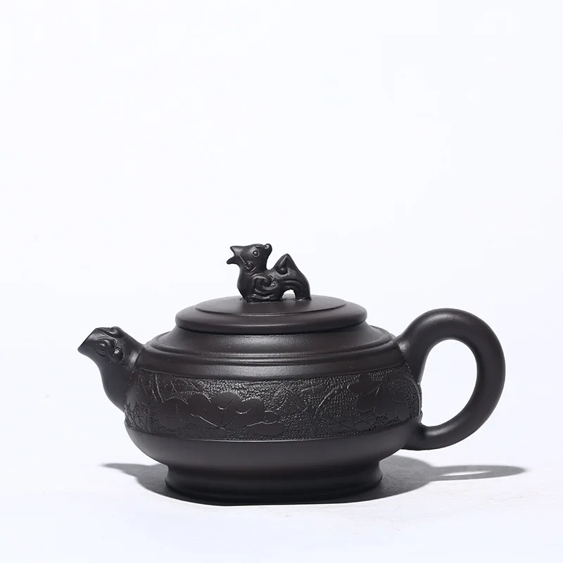 Yixing handmade purple clay teapot Xiangyun teapot raw ore black mud kungfu tea set gift
Yixing handmade purple clay teapot Xiangyun teapot raw ore black mud kungfu tea set gift