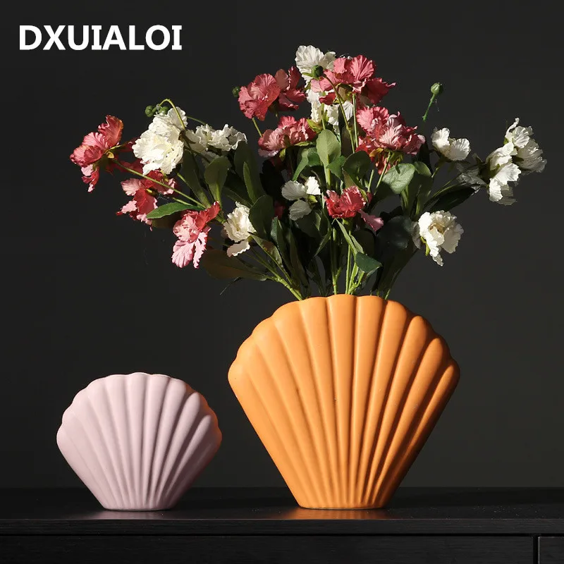 NEW Nordic art shell vase creative ceramic decoration modern minimalist home decoration decoration vase for wedding decoration
NEW Nordic art shell vase creative ceramic decoration modern minimalist home decoration decoration vase for wedding decoration