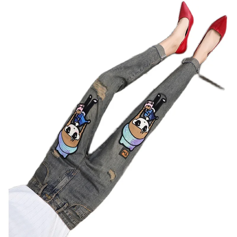 European station 2020 autumn and winter high-waist cartoon jeans women's embroidery hole straight showing thin pants trend
European station 2020 autumn and winter high-waist cartoon jeans women's embroidery hole straight showing thin pants trend