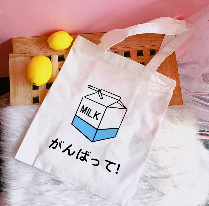 Women Milk Cartoon Print Cotton Canvas Shopper Bag Girl Harajuku 90s Y2K Classic Vintage Shoulder Handbag Female Bolsa Compra
Women Milk Cartoon Print Cotton Canvas Shopper Bag Girl Harajuku 90s Y2K Classic Vintage Shoulder Handbag Female Bolsa Compra