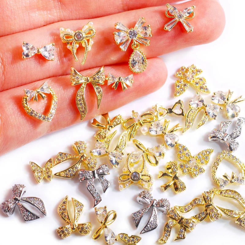 Luxury Crystal Zircon Nail Art Strass Jewelry Gold/SIlver Bowtie Butterfly Fashion Designs 3D Charms For Nail Art Decoration
Luxury Crystal Zircon Nail Art Strass Jewelry Gold/SIlver Bowtie Butterfly Fashion Designs 3D Charms For Nail Art Decoration