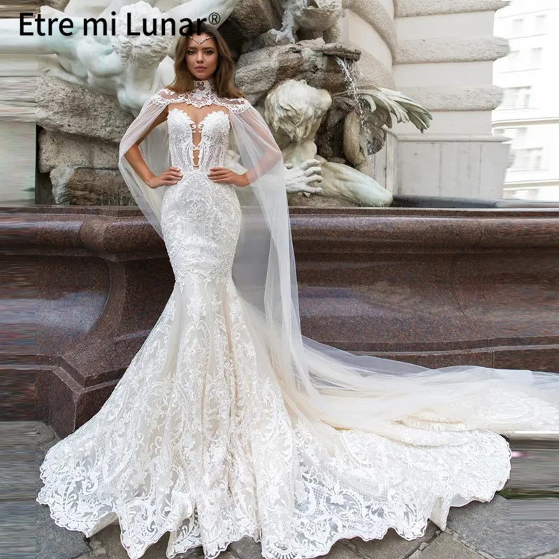 2021 кружевные свадебные платья 2020 Vestidos De Novia Русалка с украшением в виде кристаллов с плащом-накидкой с капюшоном, из прозрачной ткани в богем...
2021 кружевные свадебные платья 2020 Vestidos De Novia Русалка с украшением в виде кристаллов с плащом-накидкой с капюшоном, из прозрачной ткани в богем...