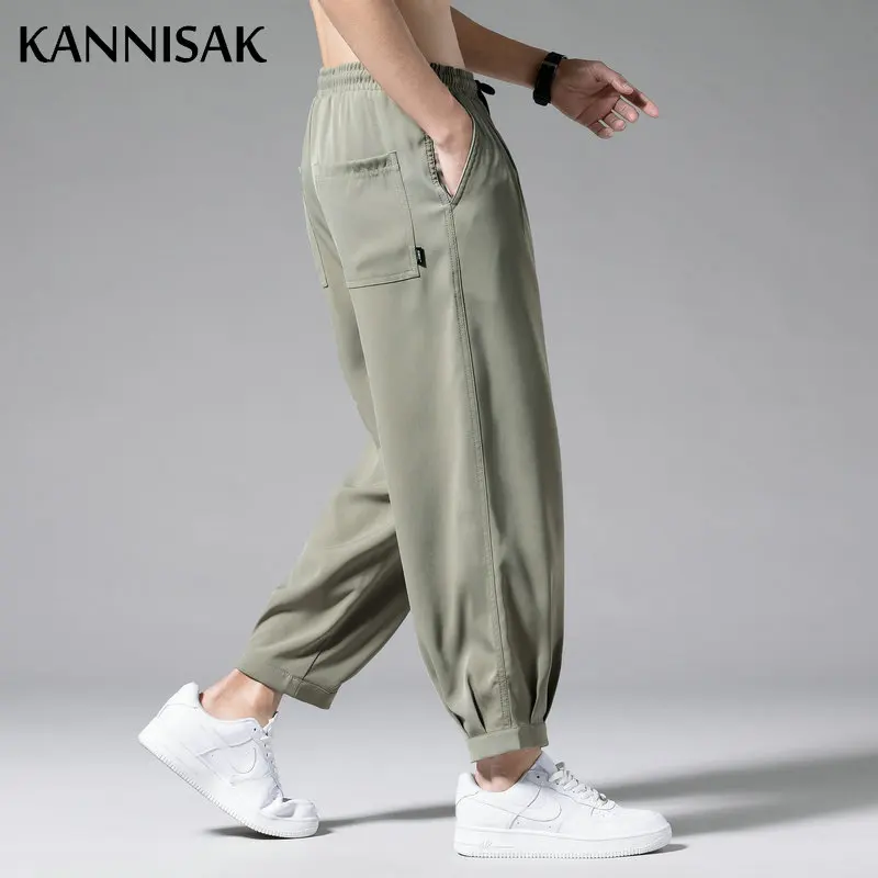KANNISAK Casual Summer Ice Silk Men Pants Lightweight Breathable Joggers Ankle Length Tie Feet Loose Trousers Male Sweatpants
KANNISAK Casual Summer Ice Silk Men Pants Lightweight Breathable Joggers Ankle Length Tie Feet Loose Trousers Male Sweatpants