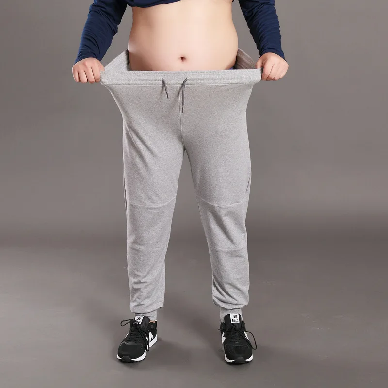 Брюки мужские однотонные эластичные с узкими штанинами свободные спортивные