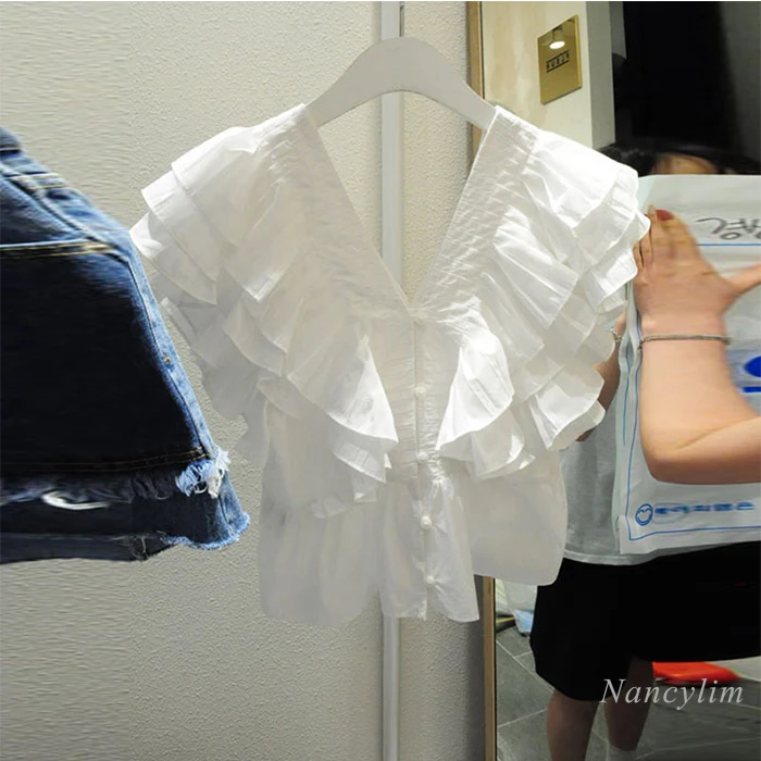 Ruffled V-neck Shirt Women 2021 Summer New Flying Sleeves White Blouse Female Lady's Fashion Tops Solid Color Blusas
Ruffled V-neck Shirt Women 2021 Summer New Flying Sleeves White Blouse Female Lady's Fashion Tops Solid Color Blusas