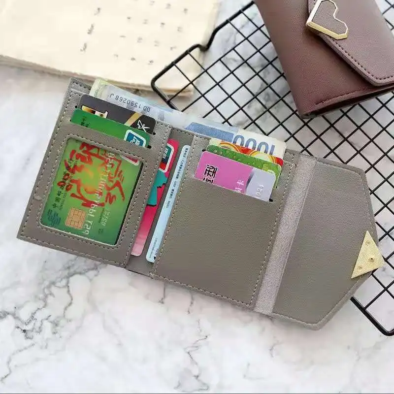 Korean version small fresh retro metal heart three fold Wallet women's short 2021 new simple women's bag student zero wallet
Korean version small fresh retro metal heart three fold Wallet women's short 2021 new simple women's bag student zero wallet