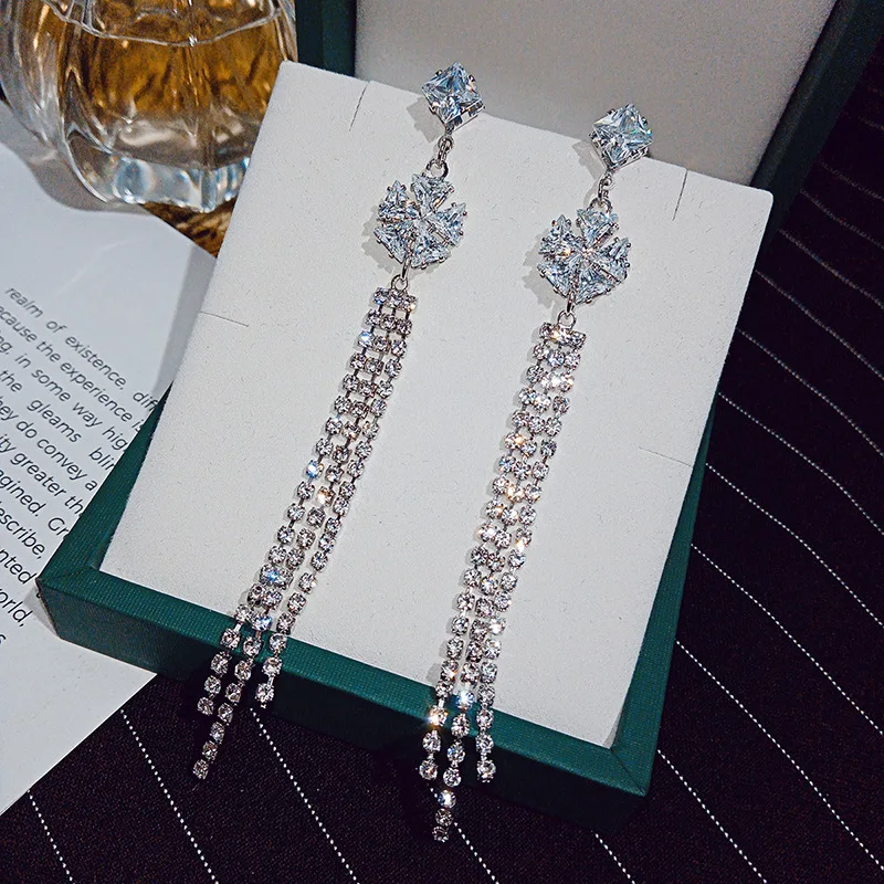 Korean earrings s925 silver full diamond earrings super flash zircon fashion earrings female long temperament earrings jewelry
Korean earrings s925 silver full diamond earrings super flash zircon fashion earrings female long temperament earrings jewelry