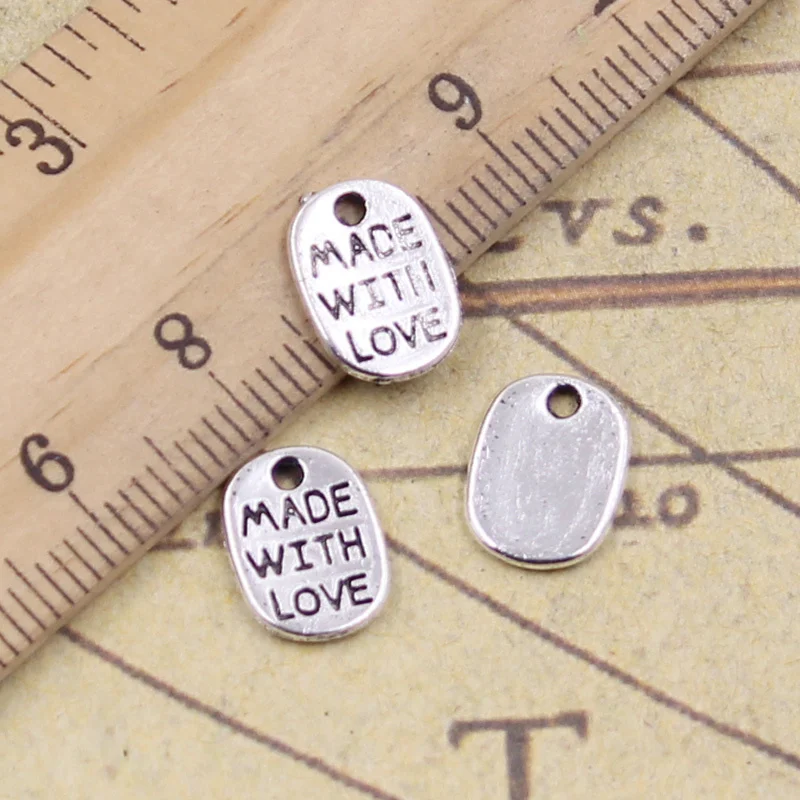 100pcs Charms Plates Made With Love 11x8mm Tibetan Silver Color Pendants Antique Jewelry Making DIY Handmade Craft
100pcs Charms Plates Made With Love 11x8mm Tibetan Silver Color Pendants Antique Jewelry Making DIY Handmade Craft