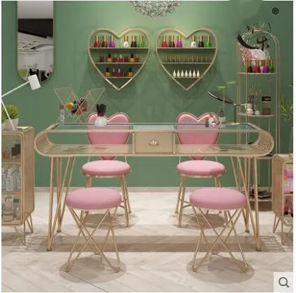 Iron art net red nail table single table and chair set nordic light luxury nail table golden paint manicure table
Iron art net red nail table single table and chair set nordic light luxury nail table golden paint manicure table