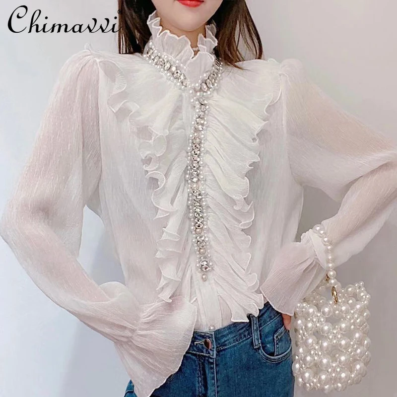All-matching Elegant Fashion Stand Collar Flare Sleeves Chiffon Shirt for Women 2021 New Sweet Beaded Rhinestone Ruffled Blouse
All-matching Elegant Fashion Stand Collar Flare Sleeves Chiffon Shirt for Women 2021 New Sweet Beaded Rhinestone Ruffled Blouse