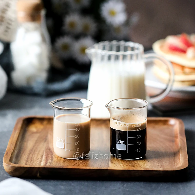 Mini Pyrex graduated measuring cup maple syrup creamer web celebrity coffee house espresso cup serving cup 
Mini Pyrex graduated measuring cup maple syrup creamer web celebrity coffee house espresso cup serving cup