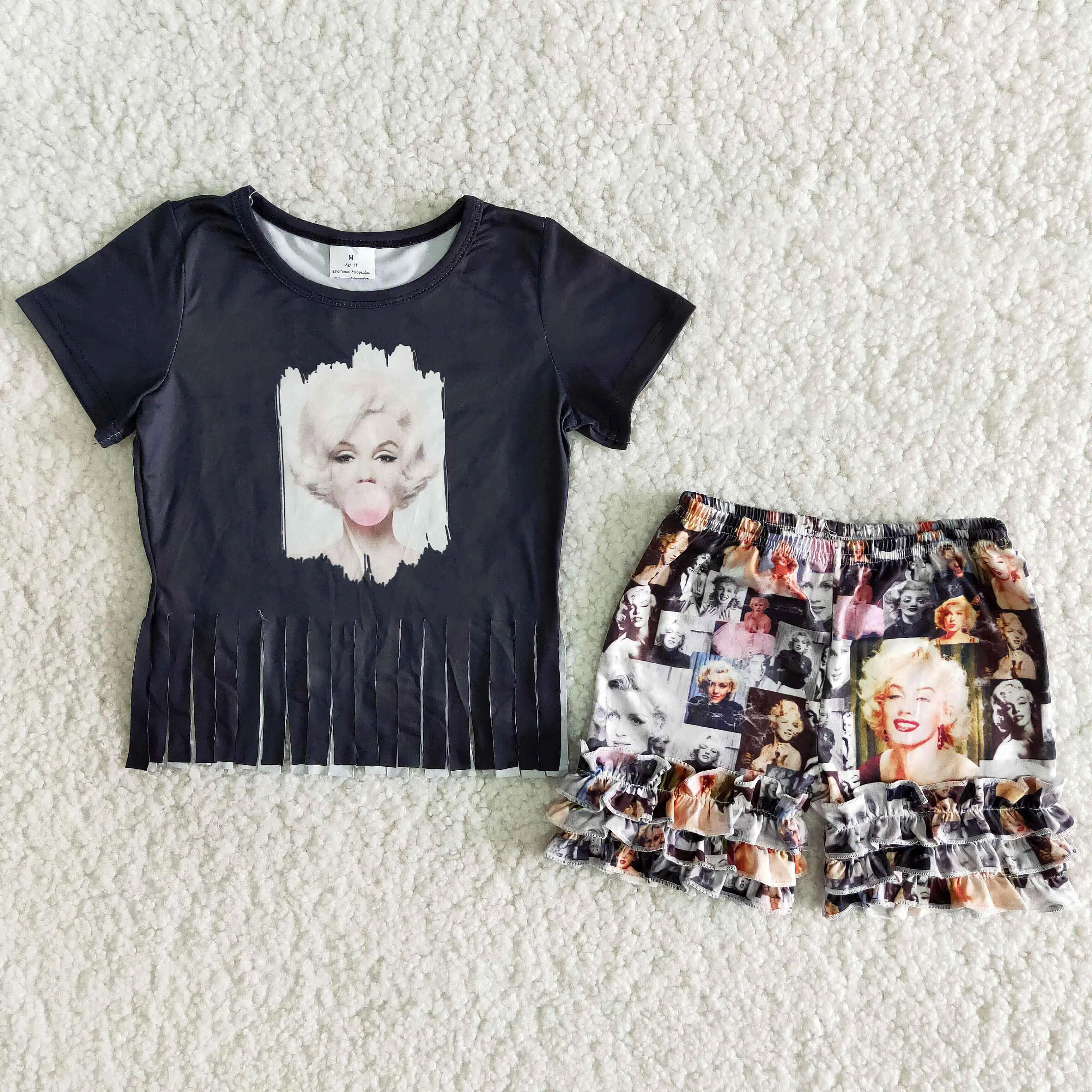 New Trend Summer Girl's Sexy Monroe Print Fringed Top With Portrait Print Pleated Shorts 
New Trend Summer Girl's Sexy Monroe Print Fringed Top With Portrait Print Pleated Shorts