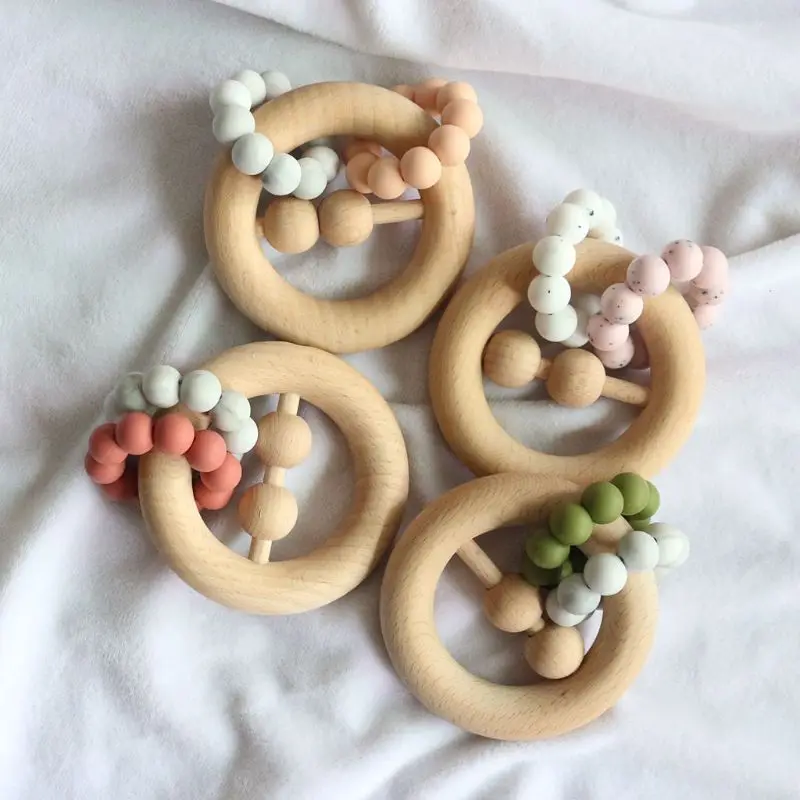 Baby Teething Wooden Ring Beaded Rattle Teether Newborn Nursing Chewing Toys Shower Gifts
Baby Teething Wooden Ring Beaded Rattle Teether Newborn Nursing Chewing Toys Shower Gifts