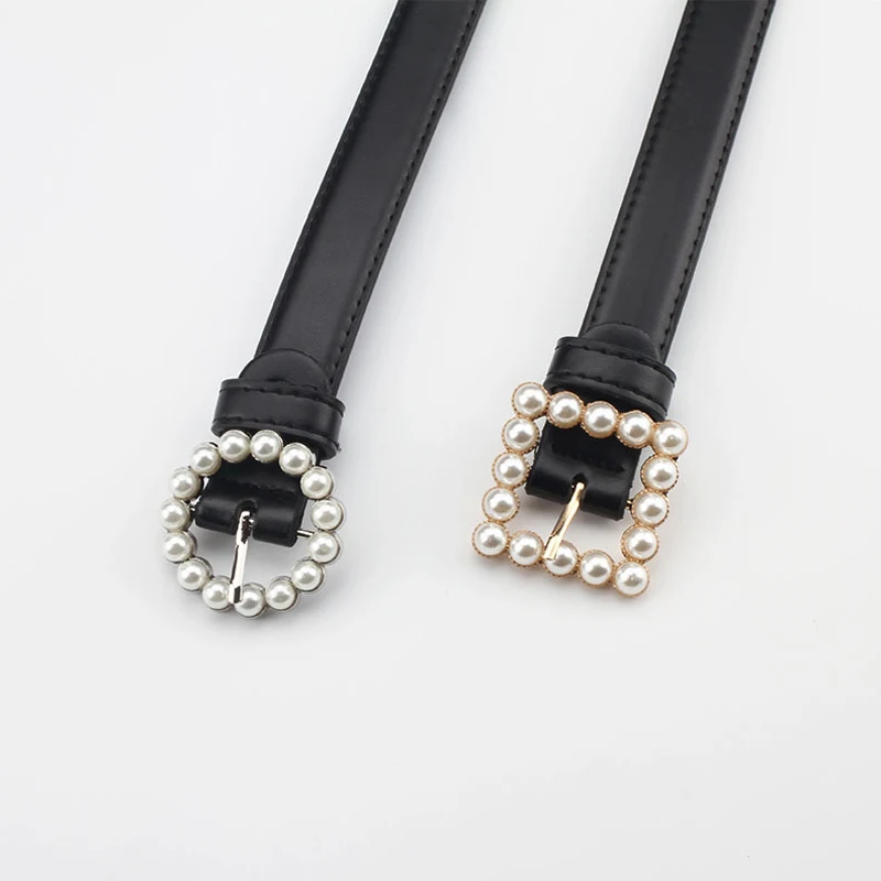 Новый кожаный ремень женские модные однотонные Цвет ремень легированная квадратная пряжка, инкрустированная жемчужными украшения сладкий... 
Новый кожаный ремень женские модные однотонные Цвет ремень легированная квадратная пряжка, инкрустированная жемчужными украшения сладкий...