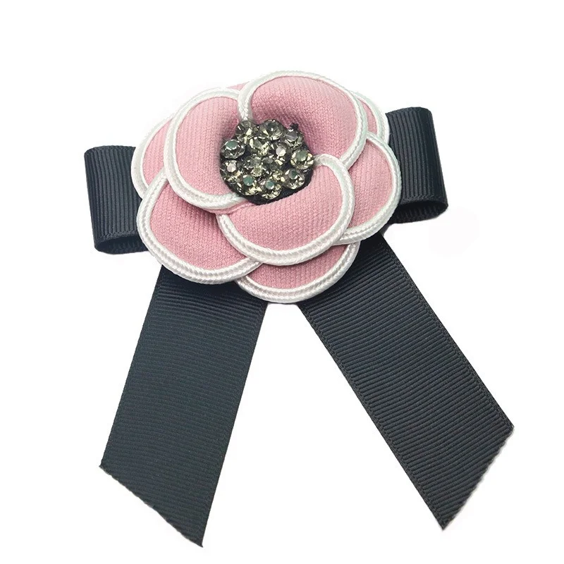 Korean Fabric Camellia Flower Brooch Crystal Ribbon Bow Tie Brooches for Women College Style Shirt Collar Pin Jewelry Gifts
Korean Fabric Camellia Flower Brooch Crystal Ribbon Bow Tie Brooches for Women College Style Shirt Collar Pin Jewelry Gifts