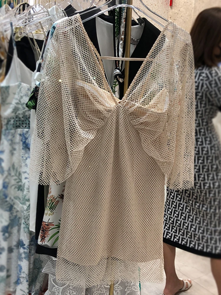 Free shipping Heavy craft nail beads diamond mesh fake two-piece dress ladies summer new sexy V-neck leaky back hips
Free shipping Heavy craft nail beads diamond mesh fake two-piece dress ladies summer new sexy V-neck leaky back hips