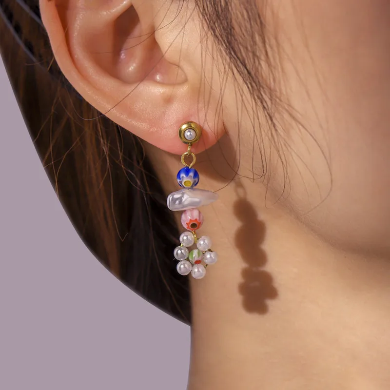Pearl flower earrings Bohemian folk wind titanium steel earrings handmade beaded earrings for women
Pearl flower earrings Bohemian folk wind titanium steel earrings handmade beaded earrings for women