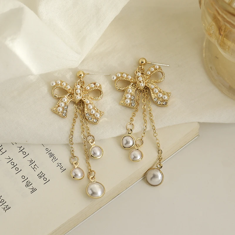 2021 Spring Festival new metal pearl earrings pendant long tassel earrings for fashionable women for earrings party gifts
2021 Spring Festival new metal pearl earrings pendant long tassel earrings for fashionable women for earrings party gifts