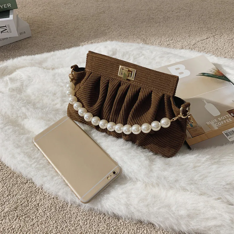Pearl Chains Clutch Tote Bags for Women Luxury Corduroy Beaded Crossbody Bag Female Small Pleated Shoulder Handbag with Lock Sac 
Pearl Chains Clutch Tote Bags for Women Luxury Corduroy Beaded Crossbody Bag Female Small Pleated Shoulder Handbag with Lock Sac