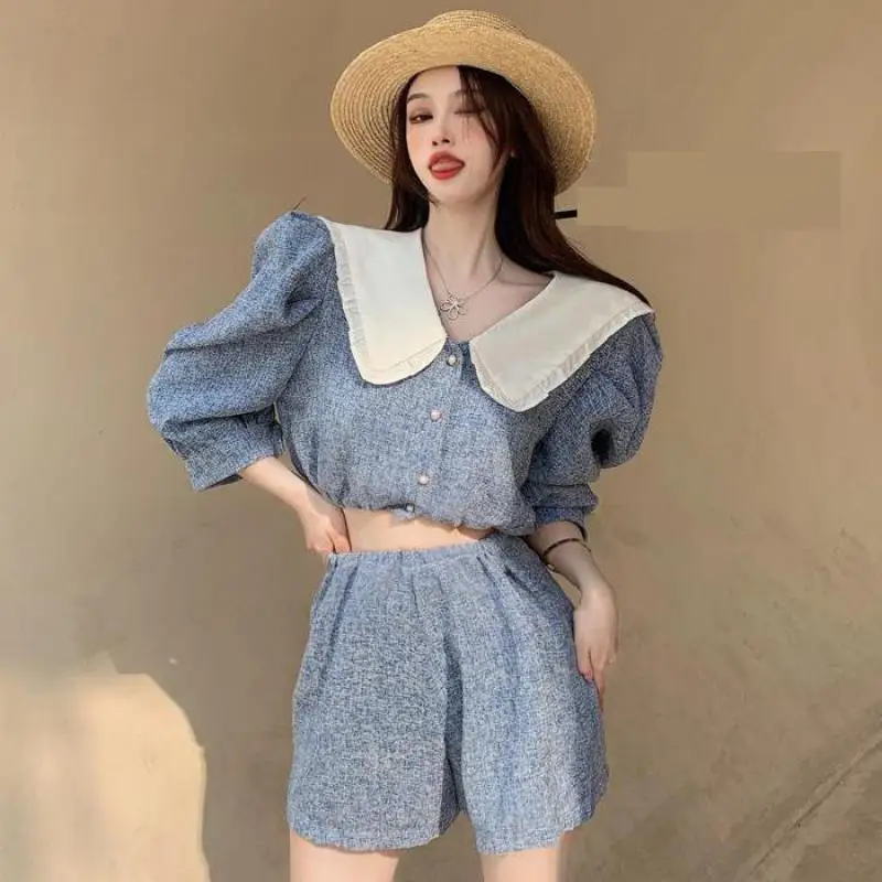 Korean Style Women Short Sleeve Shirts Summer Vintage Puff Sleeve Sweet Peter Pan Collar Loose Crop Top Shirt Blouse 
Korean Style Women Short Sleeve Shirts Summer Vintage Puff Sleeve Sweet Peter Pan Collar Loose Crop Top Shirt Blouse