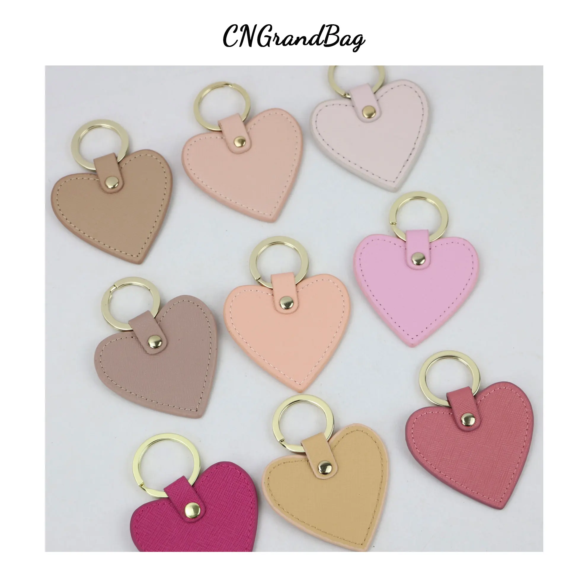 New fashion free custom initial letters genuine saffiano leather heart shape keychain women key holder female heart key ring 
New fashion free custom initial letters genuine saffiano leather heart shape keychain women key holder female heart key ring