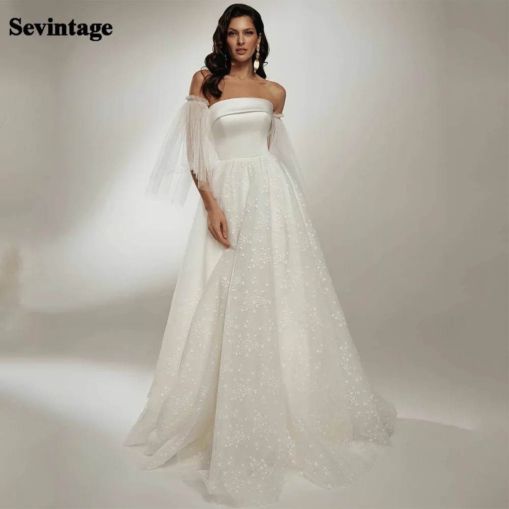 Sevintage Boho Wedding Dresses Puff Sleeves Strapless Lace Appliques Modern Bride Gowns A-Line Wedding Gown 2021 Custom Made
Sevintage Boho Wedding Dresses Puff Sleeves Strapless Lace Appliques Modern Bride Gowns A-Line Wedding Gown 2021 Custom Made