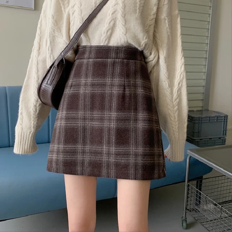 New autumn/winter 2021 high-waisted woollen a-line skirts retro plaid skirts with slimming skirts
New autumn/winter 2021 high-waisted woollen a-line skirts retro plaid skirts with slimming skirts