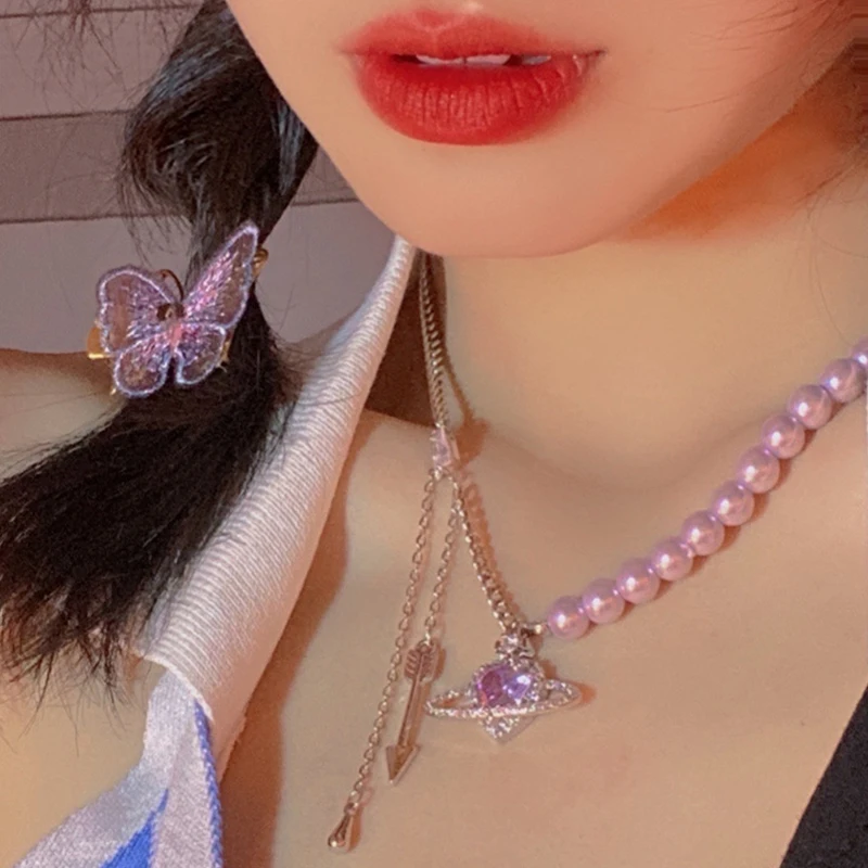 Vintage Heart Saturn Planet Pendant Pearl Choker Necklace for Women Girls Purple Pearl Chain Necklaces Party Jewelry
Vintage Heart Saturn Planet Pendant Pearl Choker Necklace for Women Girls Purple Pearl Chain Necklaces Party Jewelry
