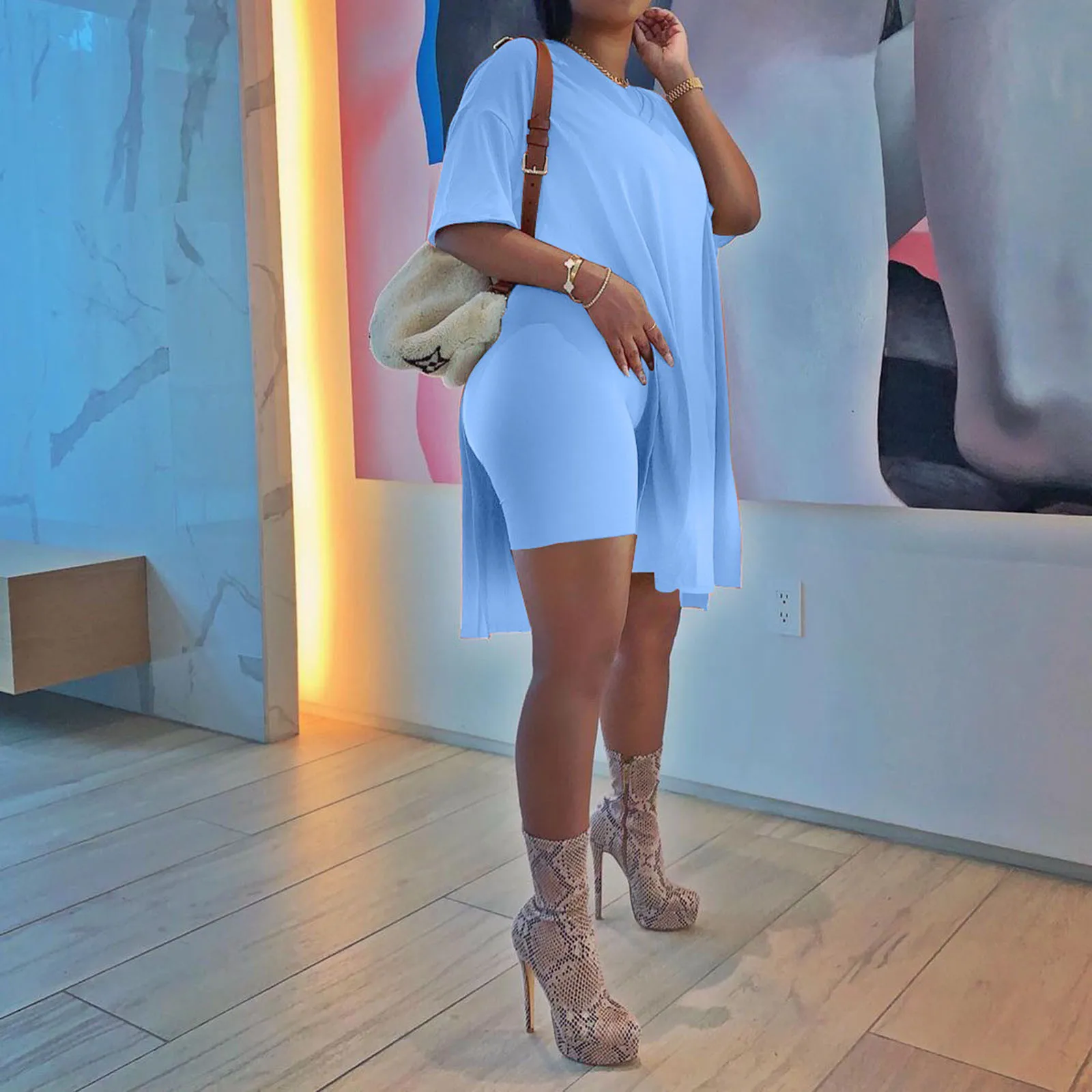 Oversized Womens Summer Two Piece Outfits Ladies Loose Short Sleeve Side Split Tops Biker Shorts Sets Vetement Femme 2021 A40
Oversized Womens Summer Two Piece Outfits Ladies Loose Short Sleeve Side Split Tops Biker Shorts Sets Vetement Femme 2021 A40