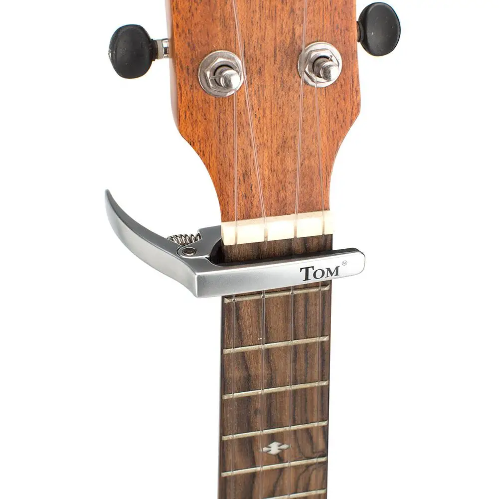 New TAC-U1 Professional Ukulele Capo Guitar Ukelele Capo Guitar Parts Capo Silver Zinc Alloy Music Instrument Accessories
New TAC-U1 Professional Ukulele Capo Guitar Ukelele Capo Guitar Parts Capo Silver Zinc Alloy Music Instrument Accessories