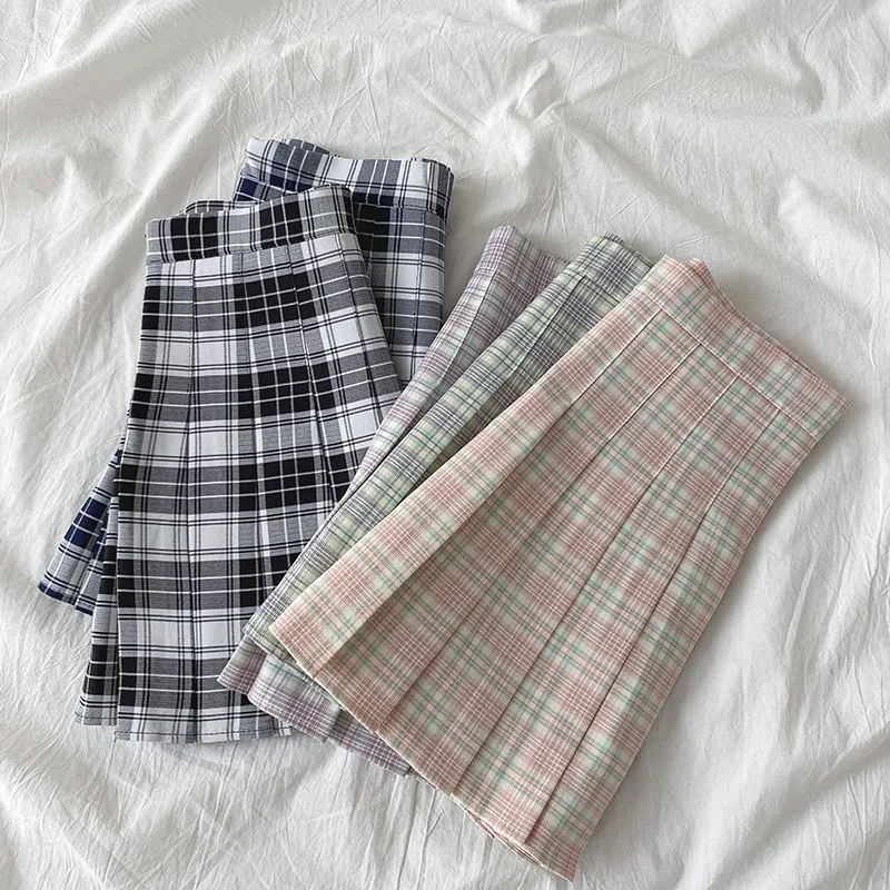 Plaid skirt female spring 2021 new Korean style high waist a-line pleated short skirts
Plaid skirt female spring 2021 new Korean style high waist a-line pleated short skirts