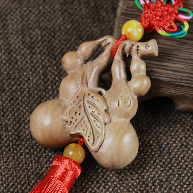 Peach wood gourd carving Pendant car pendant hand play feng shui home creative gourd wood carving pendant crafts
Peach wood gourd carving Pendant car pendant hand play feng shui home creative gourd wood carving pendant crafts