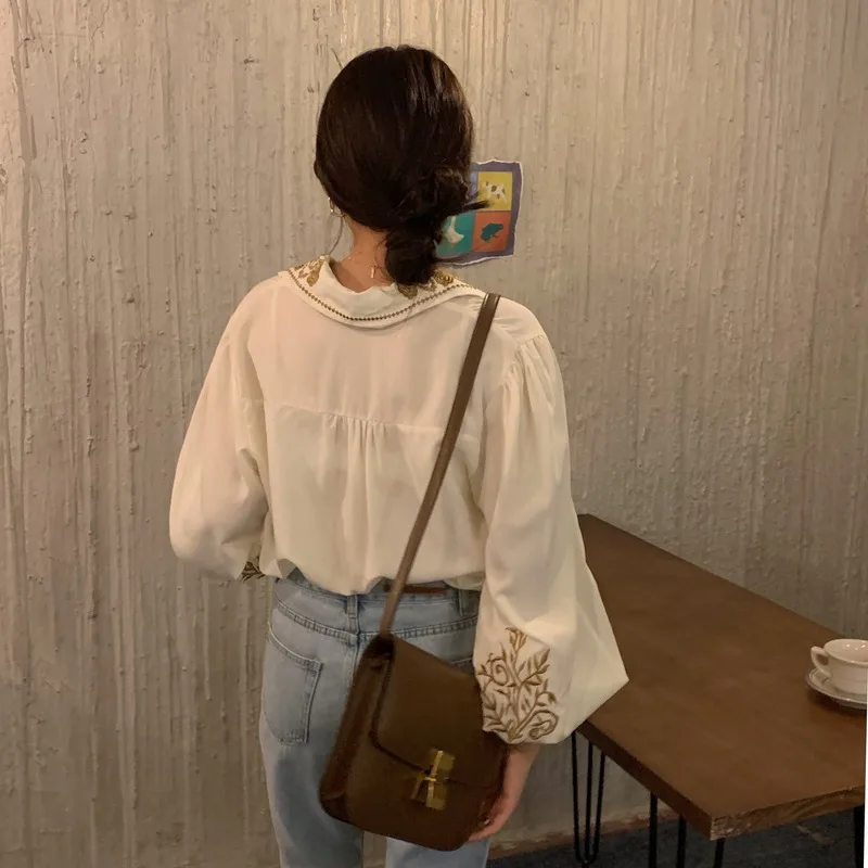 Women's Retro Palace Style Shirts Solid V-Neck Embroidered Lantern Sleeves Loose Blouse Oversized Shirts Autumn Spring 2021
Women's Retro Palace Style Shirts Solid V-Neck Embroidered Lantern Sleeves Loose Blouse Oversized Shirts Autumn Spring 2021
