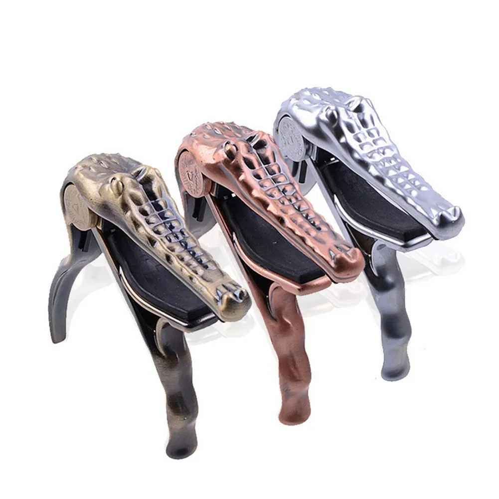 Alice Guitar Capo Trigger Metal Crocodile Head For Folk Acoustic Electric Classical Guitar Ukulele Banjo Capo Clamp Key Copper
Alice Guitar Capo Trigger Metal Crocodile Head For Folk Acoustic Electric Classical Guitar Ukulele Banjo Capo Clamp Key Copper