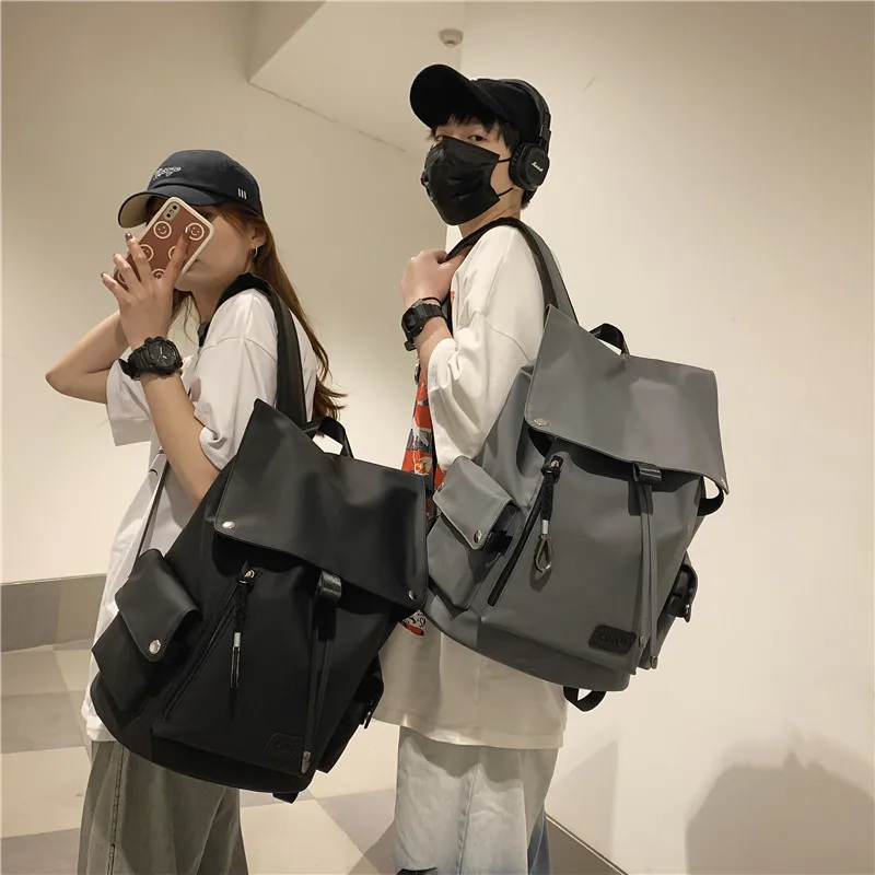 Flip the shoulder bag men's new trend fashion high-capacity backpack female junior high school students class bag
Flip the shoulder bag men's new trend fashion high-capacity backpack female junior high school students class bag