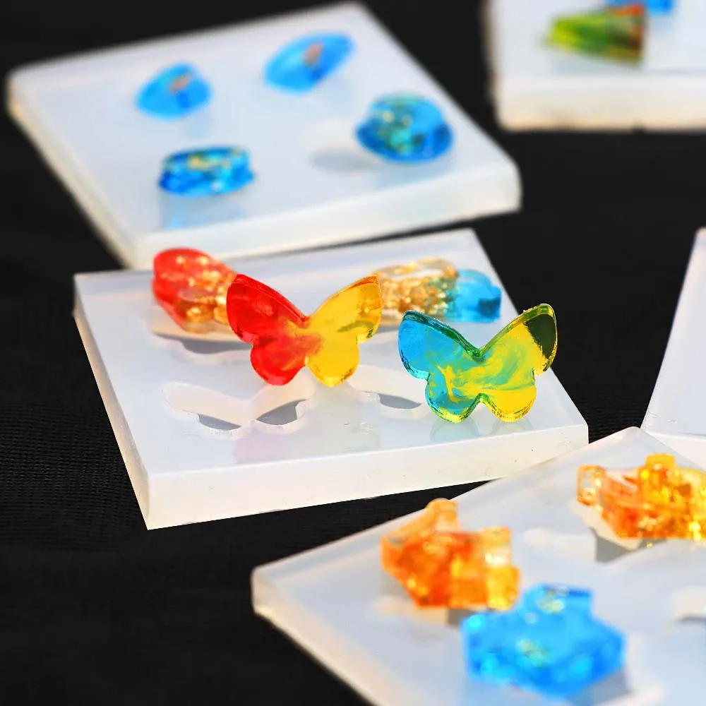 9pcs Butterfly Resin Silicone Molds Crown Cloth Silicone Molds for Resin Letter Number Keychain Epoxy Molds for Nail Art Making
9pcs Butterfly Resin Silicone Molds Crown Cloth Silicone Molds for Resin Letter Number Keychain Epoxy Molds for Nail Art Making