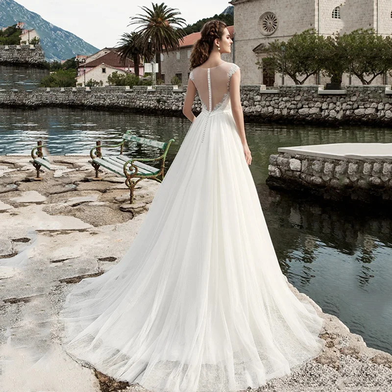 MNGRL Simple Retro Wedding Gown O-neck White Lace 3D Flower Sleeveless Fluffy Skirt Plus Size Tail Bridal Dresses
MNGRL Simple Retro Wedding Gown O-neck White Lace 3D Flower Sleeveless Fluffy Skirt Plus Size Tail Bridal Dresses
